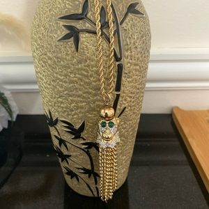 KJL vintage gold tone figural tassel pendant on chain